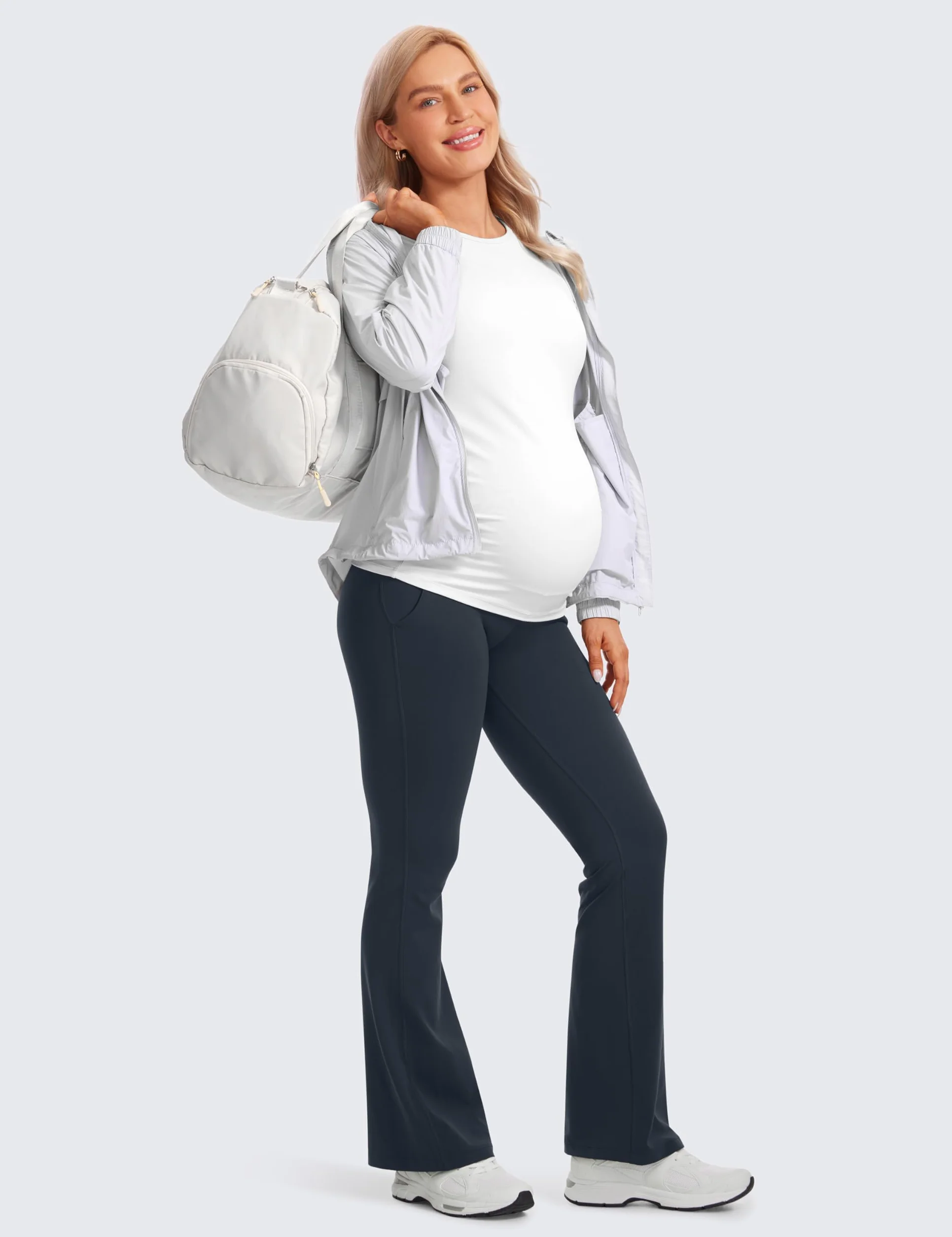CRZ YOGA Damskie legginsy ciążowe Butterluxe z kieszeniami, rozkloszowane 31 cali – spodnie ciążowe do ćwiczeń i jogi, miękkie z odkrytym brzuchem