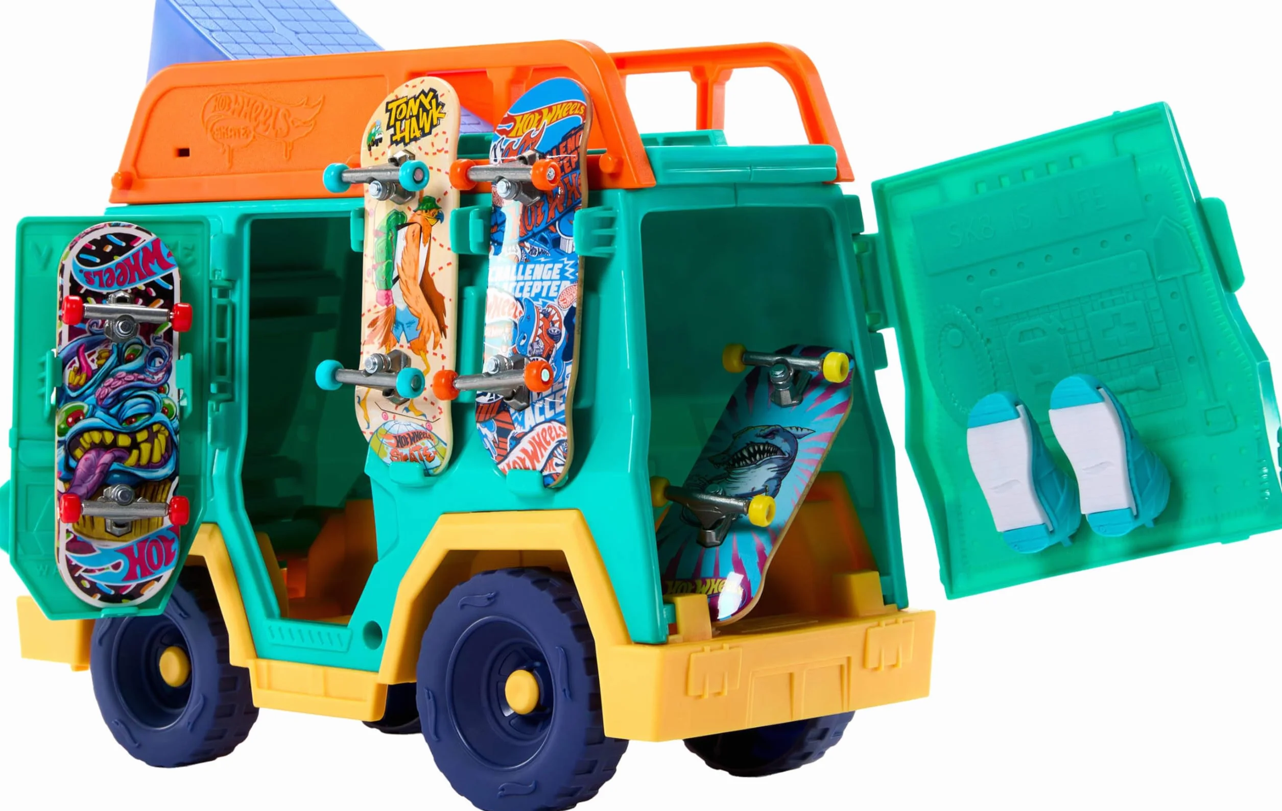Hot Wheels Skate Van Pojazd i zestaw do zabawy 2 w 1 zaprojektowany we współpracy z Tonym Hawkiem, z wyjątkową deskorolką do jazdy palcami i parą butów na palce, zabawka dla dzieci, JGG91