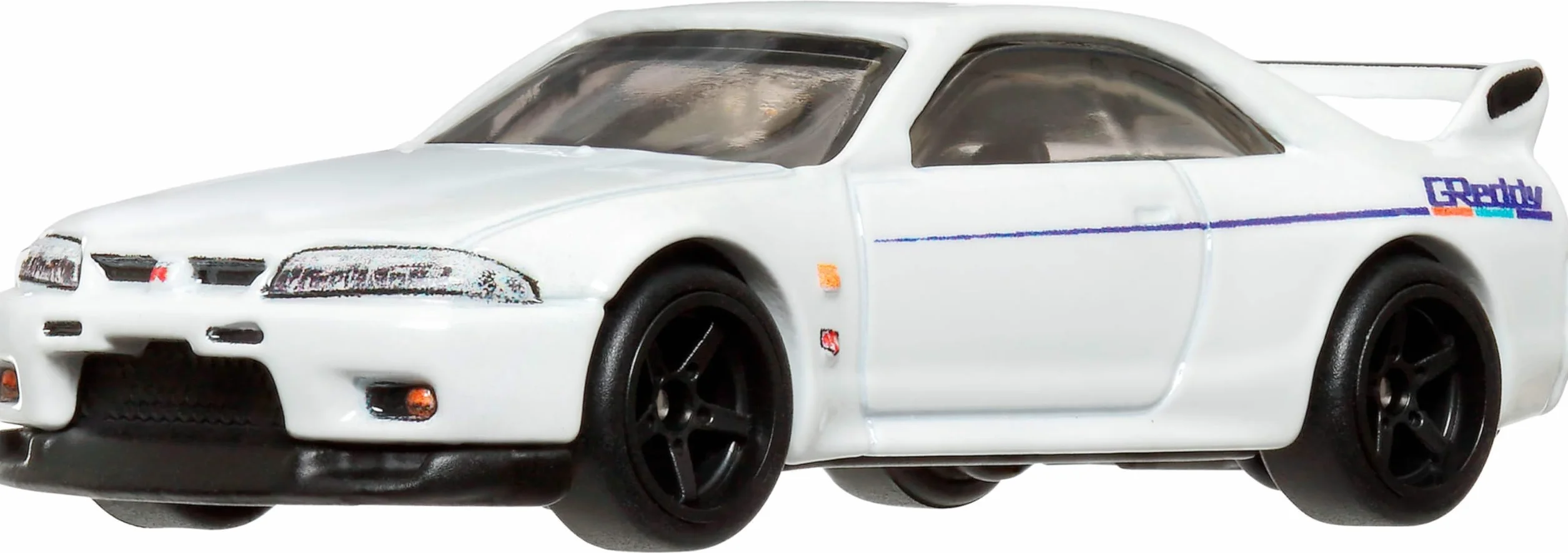 Hot Wheels Premium Nissan Skyline R-33, Kultowe auto Pojazd premium w skali 1:64, dla dzieci od 3 roku życia oraz dorosłych fanów i kolekcjonerów, HRV99