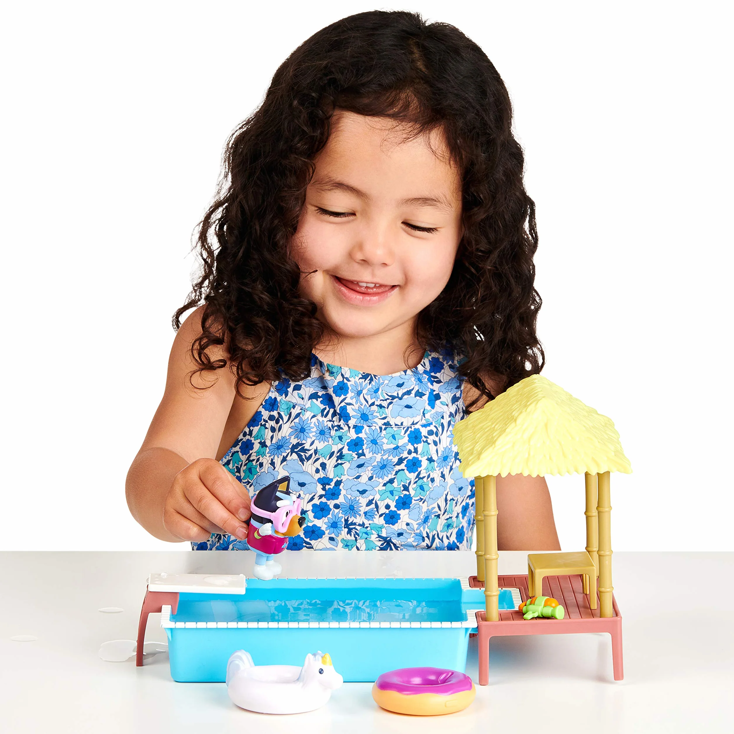 Bluey Pool Time Fun Playset: Bluey figure in Swim Suit, Pool with Diving Board and Deck and 4 Pool Accessories