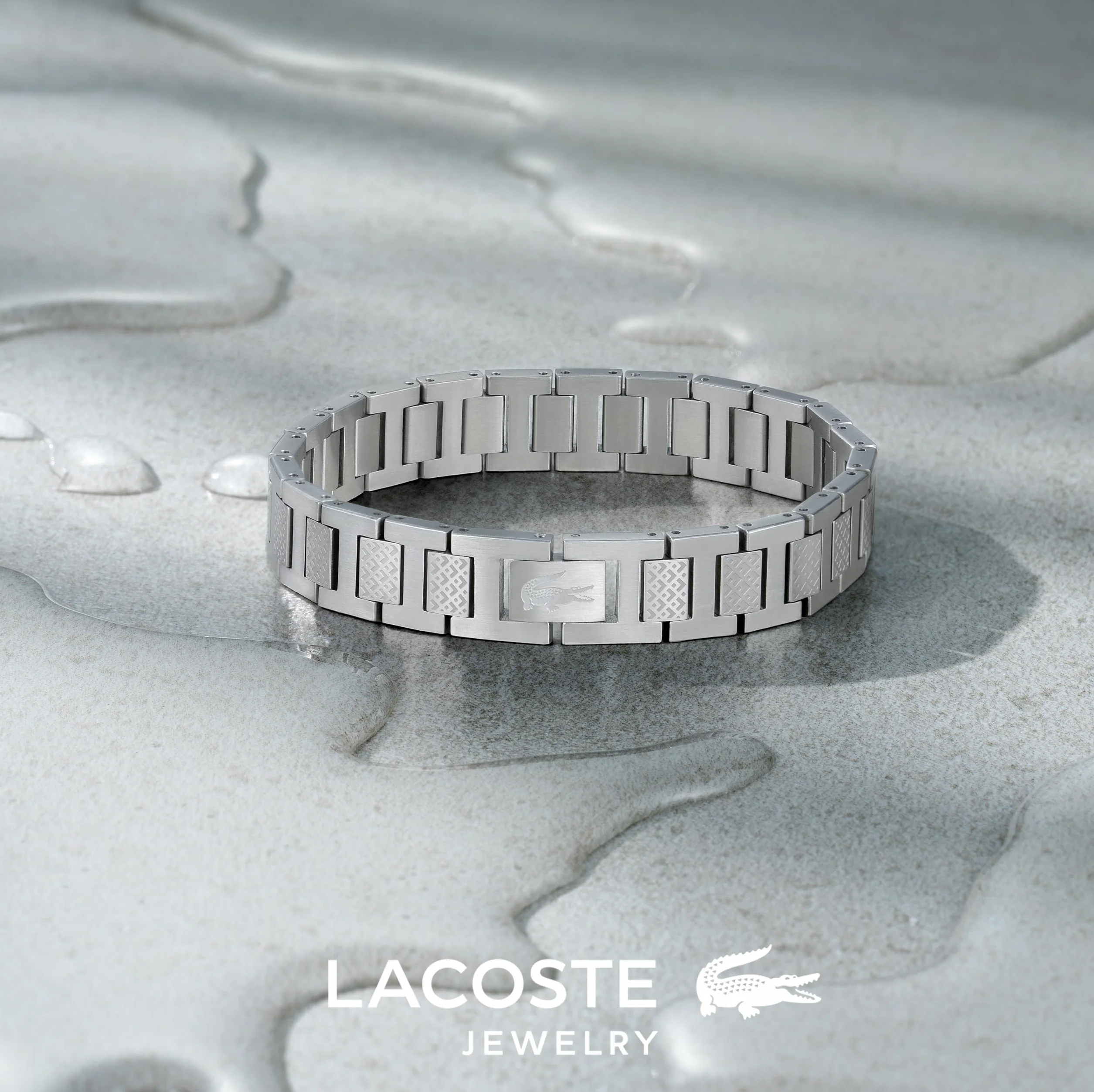 Lacoste METROPOLE Collection Link Bransoletka ze stali nierdzewnej ozdobiona wzorem petit piqué - dostępna dla niego i dla niej
