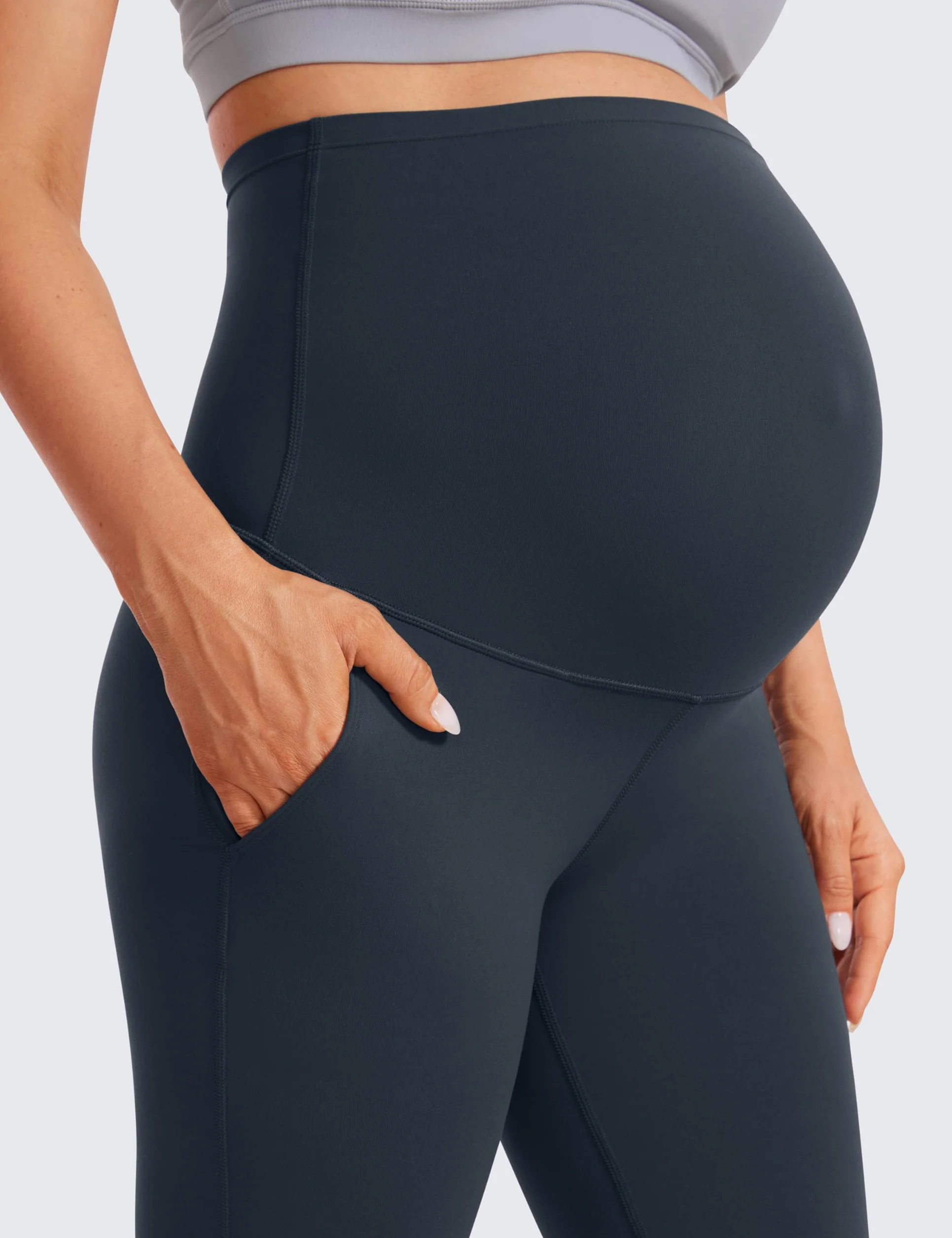 CRZ YOGA Damskie legginsy ciążowe Butterluxe z kieszeniami, rozkloszowane 31 cali – spodnie ciążowe do ćwiczeń i jogi, miękkie z odkrytym brzuchem