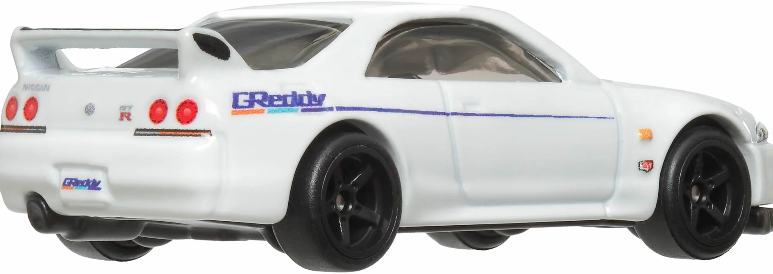 Hot Wheels Premium Nissan Skyline R-33, Kultowe auto Pojazd premium w skali 1:64, dla dzieci od 3 roku życia oraz dorosłych fanów i kolekcjonerów, HRV99